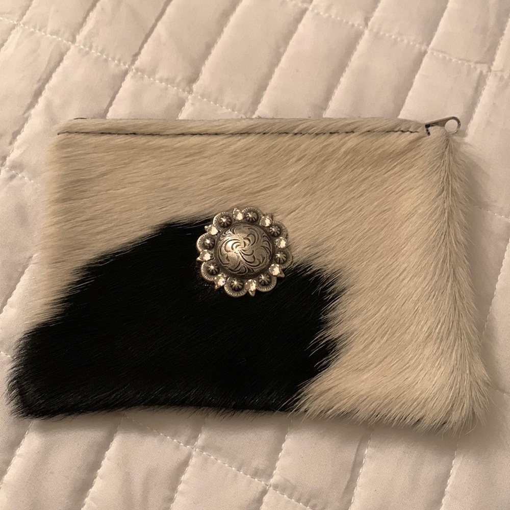 Cowhide jeweled zip bag. Black and white. Black suede back. Silver hardware.NWOT